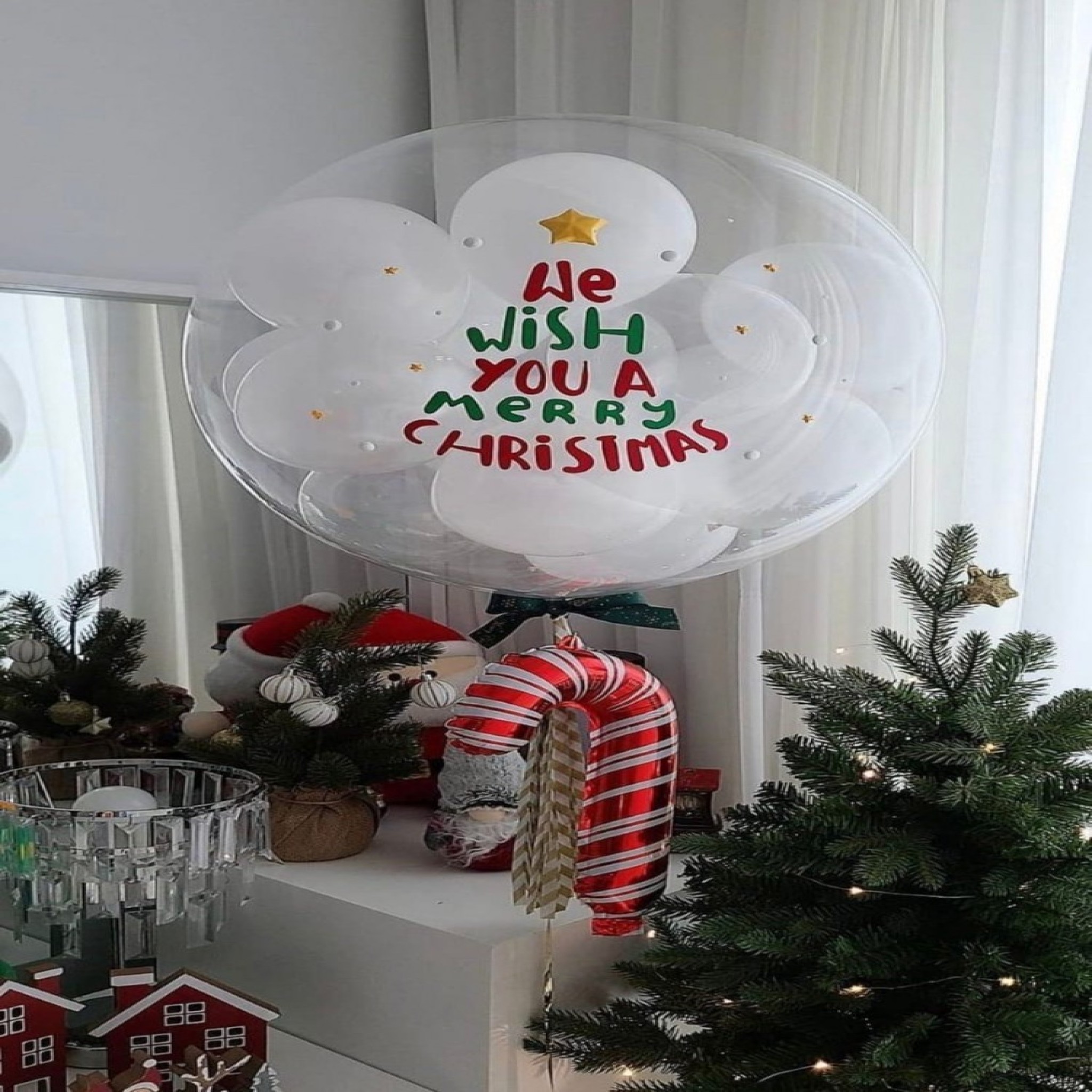 We Wish You a Merry Christmas' Confetti Balloon Display